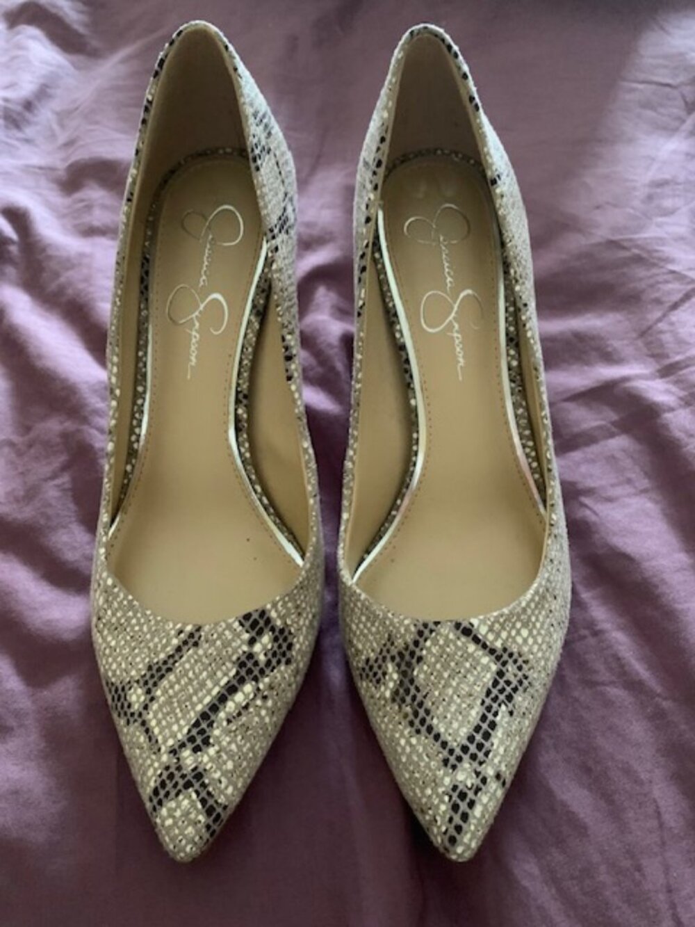 Jessica Simpson snake skin pattern pumps. Size 9m Lightly used